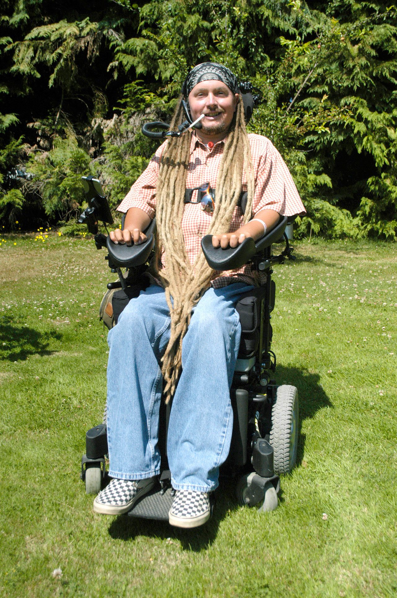Chris McDaniel/Peninsula Daily News                                Ian MacKay, seen here, this month will be taking his motorized wheelchair on a 300 mile journey along Washington state’s bike paths and trails - starting in Victoria, British Columbia and ending in Portland, Oregon to raise awareness about the need by wheelchair bound people for access to public trails.