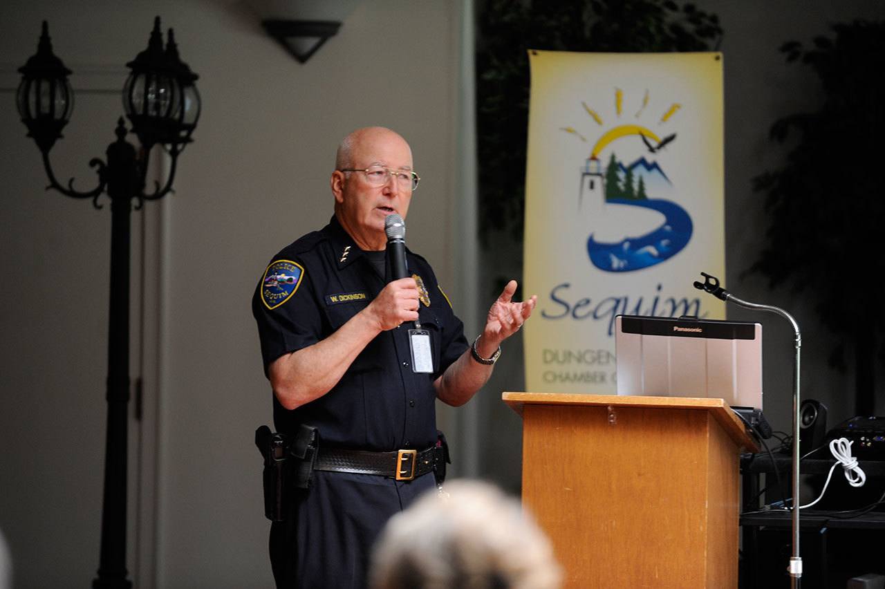 Sequim police chief Bill Dickinson speaks at a Sequim-Dungeness Valley Chamber of Commerce meeting Tuesday. (Michael Dashiell/Olympic Peninsula News Group)