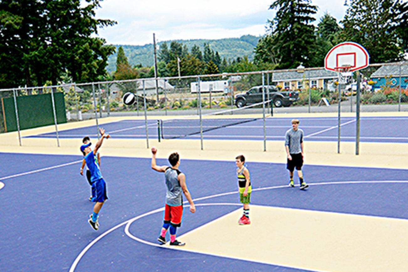 Quilcene basketball, tennis courts spruced up with fresh layer of asphalt, new paint job