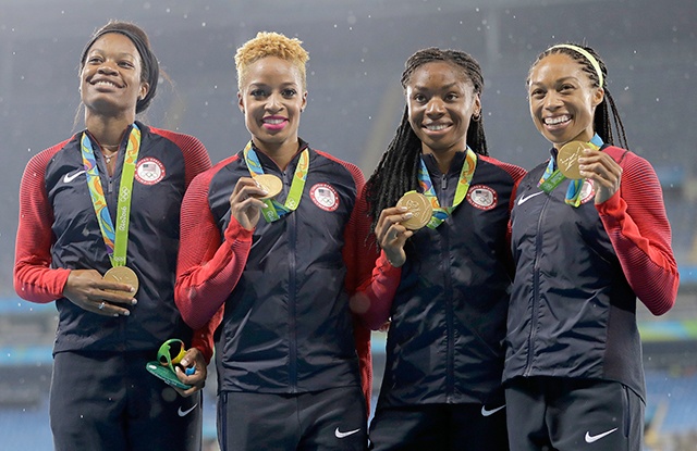 The Associated Press The United States women’s 4x400 meter relay team members, Courtney Okolo, Natasha Hastings, Phyllis Francis and Allyson Felix celebrate their gold medals on the podium during athletics competitions at the Summer Olympics inside Olympic stadium in Rio de Janeiro, Brazil, Saturday, Aug. 20, 2016.