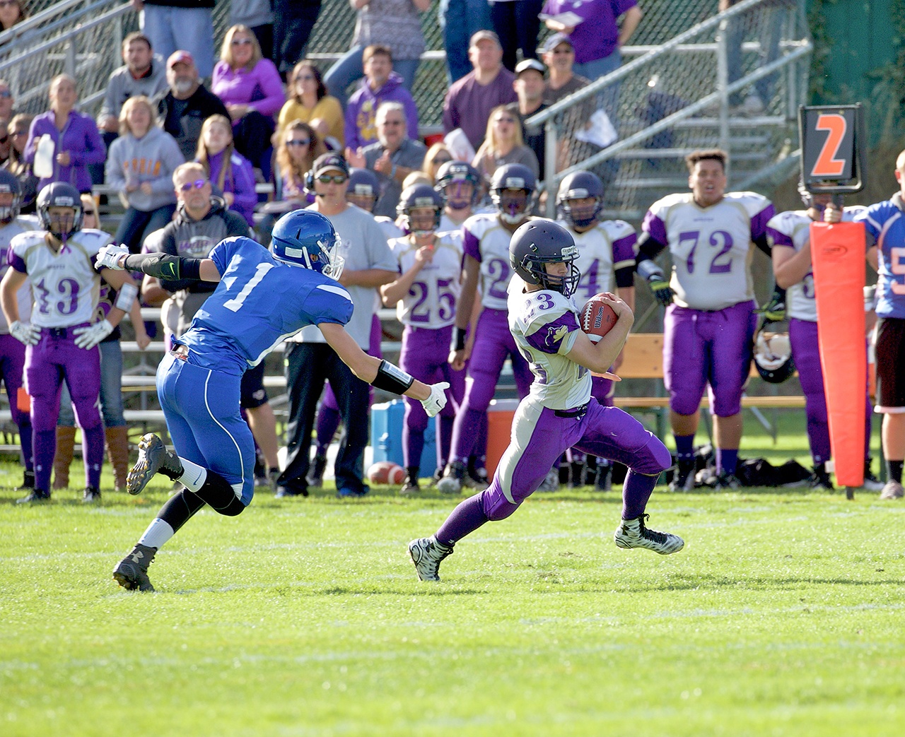 Steve Mullensky/for Peninsula Daily News Sequim’s shifty Gavin Velarde slips past a Chimacum player during a 2015 game.