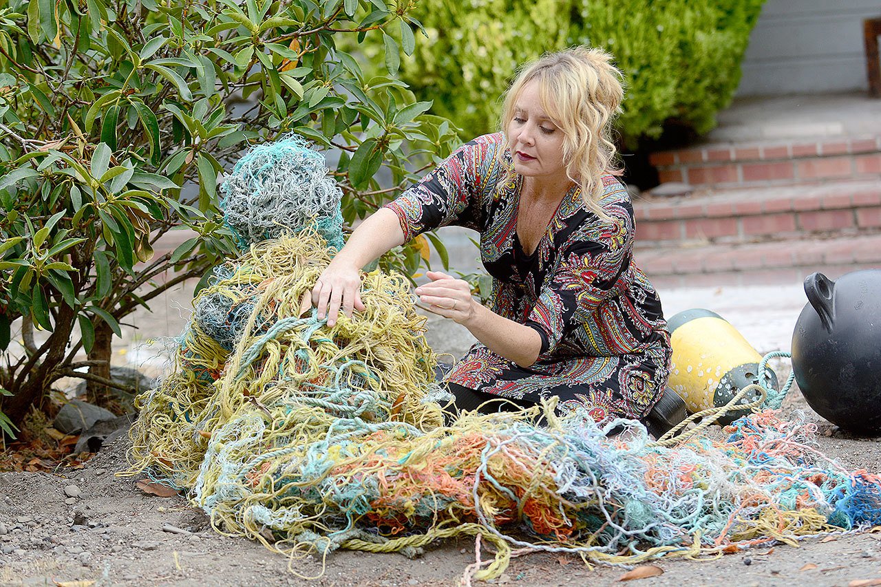 Sarah Tucker of Port Angeles will use a $600 grant from the Awesome Port Angeles Workshop to create a “Merpeople Picnic” sculpture out of sea debris. Tucker said one of the goals is to call attention to the amount of debris washing ashore. (Jesse Major/Peninsula Daily News)