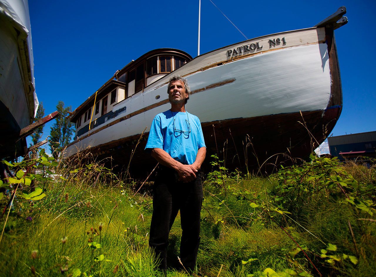 Marc Landry, who purchased the Seattle Harbor Patrol Boat No. 1 in June of 2008, spent over $185,000 and between 7,500-9,000 man hours restoring the wooden ship, which now sits at a shipyard at the Port of Port Townsend. (Sy Bean/The Seattle Times via AP)