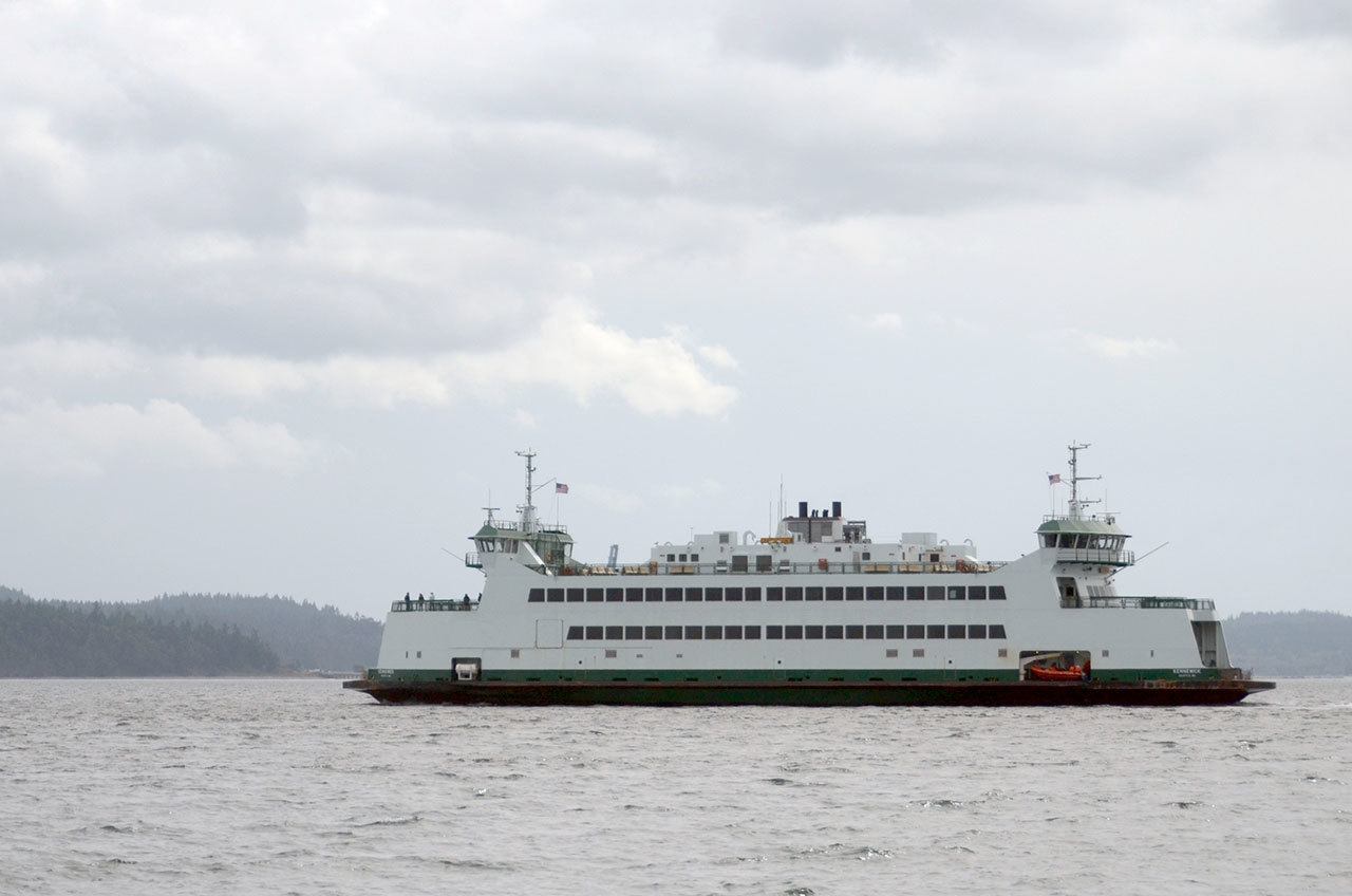 A ferry crosses the Puget Sound between Coupeville and Port Townsend. Washington State Ferries expects record traffic on ferry routes during the Labor Day weekend and urges passengers to prepare for long waits. (Cydney McFarland/Peninsula Daily News)