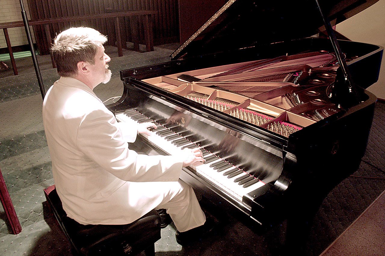 Pianist Ken Young at 7 tonight will perform live in concert at St. Matthew’s Lutheran Church in Port Angeles. — Chris McDaniel/Peninsula Daily News