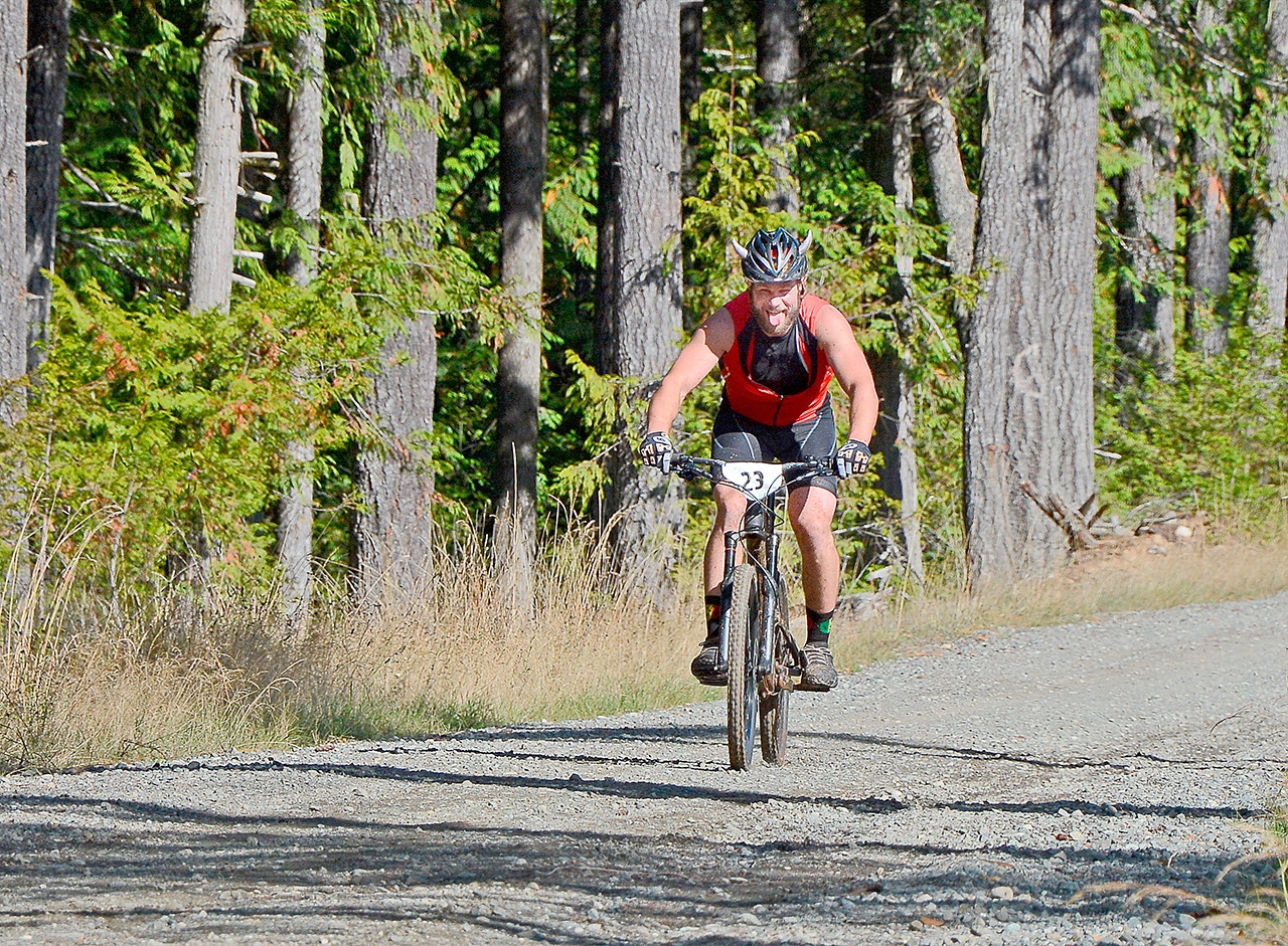 Jay Cline Port Angeles’ Joey Ciarlo rides during the downhill mountain biking portion of the 2015 Big Hurt endurance race.