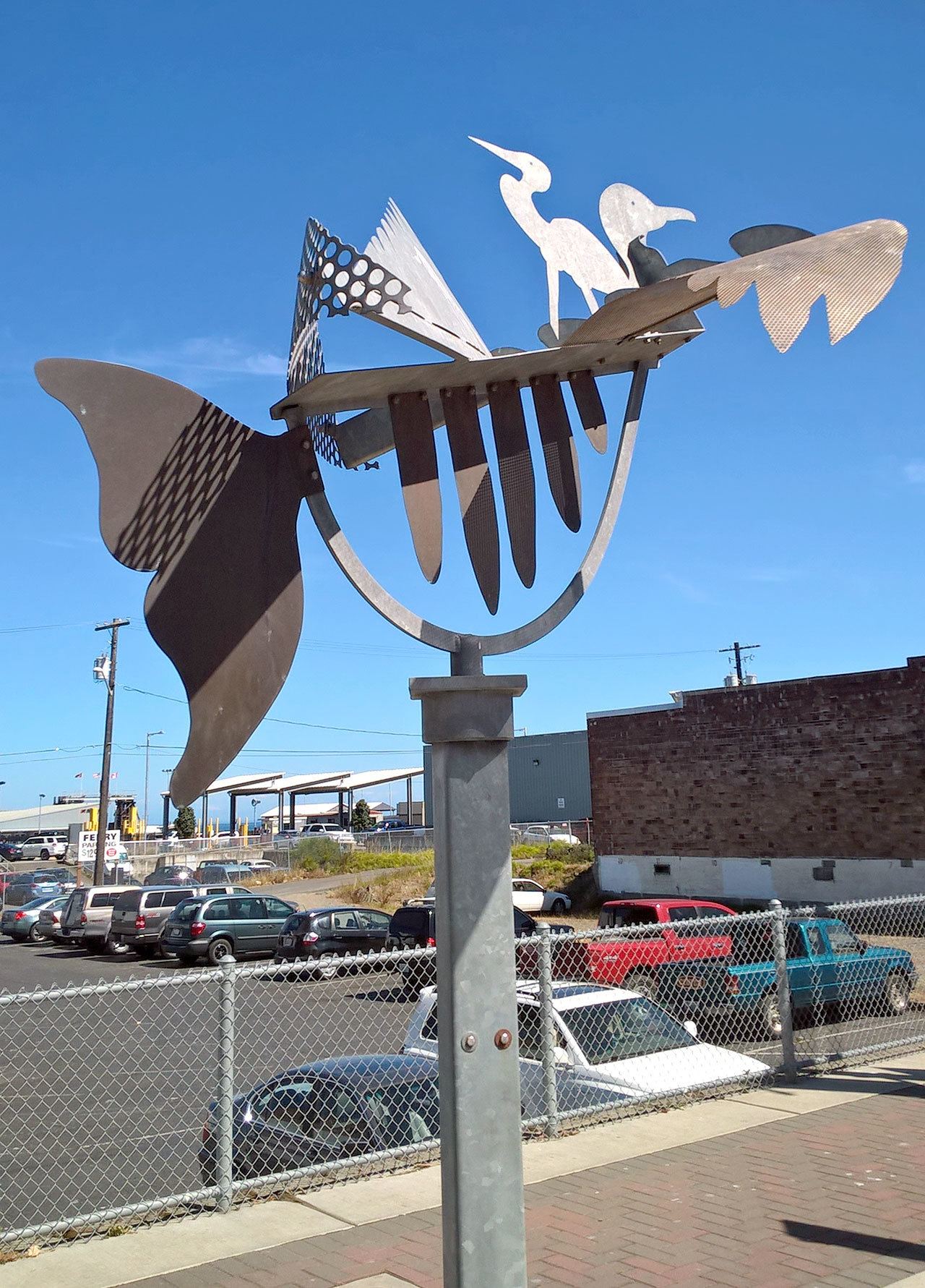 The Port Angeles Downtown Association is raising money to purchase a kinetic sculpture by Seattle artist Shawn Johnson, “Birds of a Feather,” so it can be permanently displayed on Front Street in Port Angeles. (Richard Stephens)