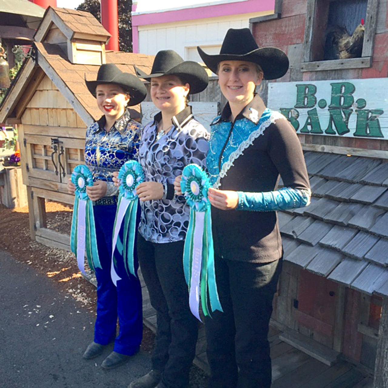 Russelle Graf Clallam County 4-H Senior Division riders who competed at the Washington State Fair in Puyallup, from left, Emily Menchew, Madison Green and Kaylie Graf.