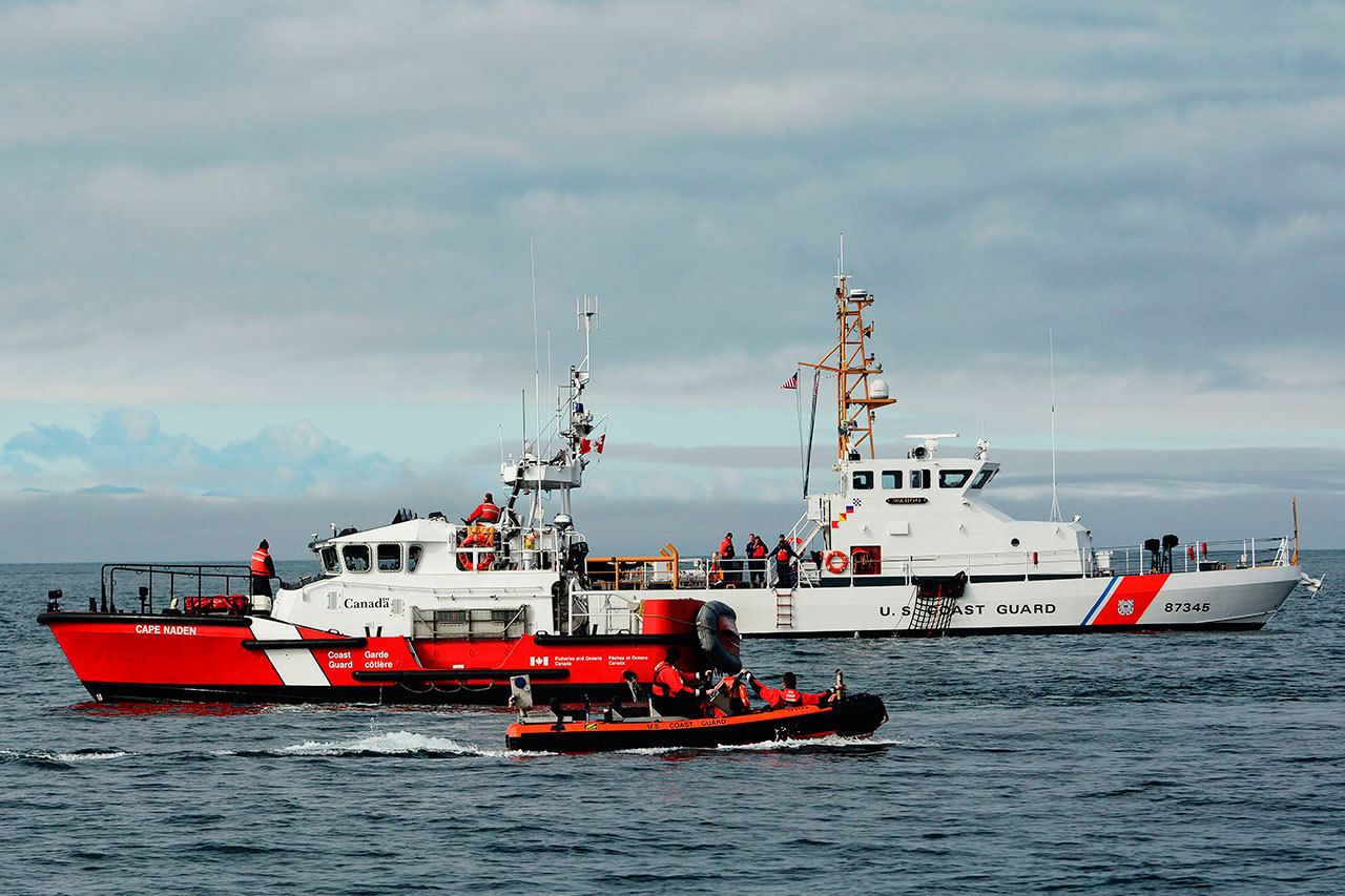 U.S. and Canadian coast guards respond in an international mass-rescue drill in the Strait of Juan de Fuca on Tuesday. (Jesse Major/Peninsula Daily News)