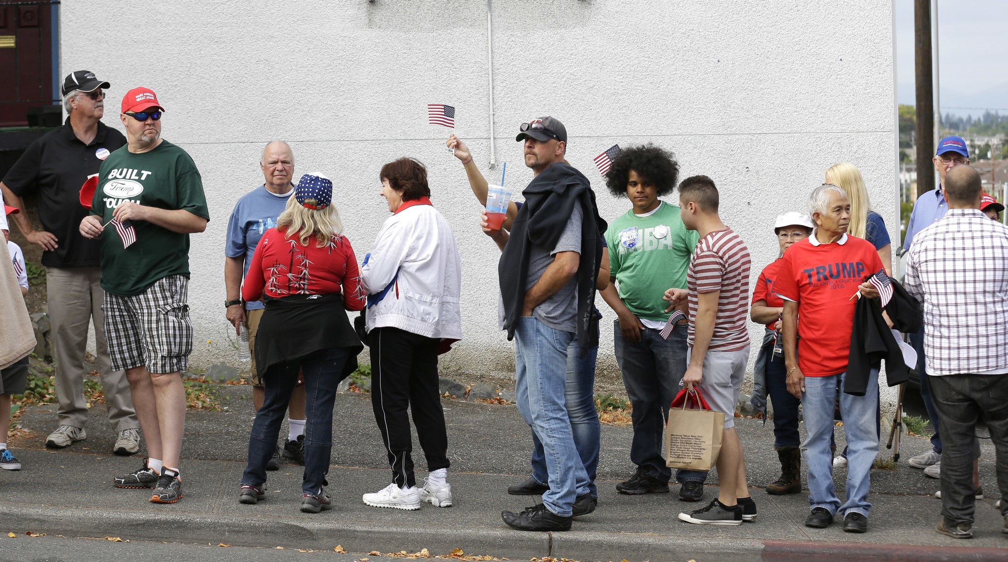 Supporters of Republican presidential candidate Donald Trump wait in line for a rally Tuesday in Everett. (Ted S. Warren/The Associated Press)
