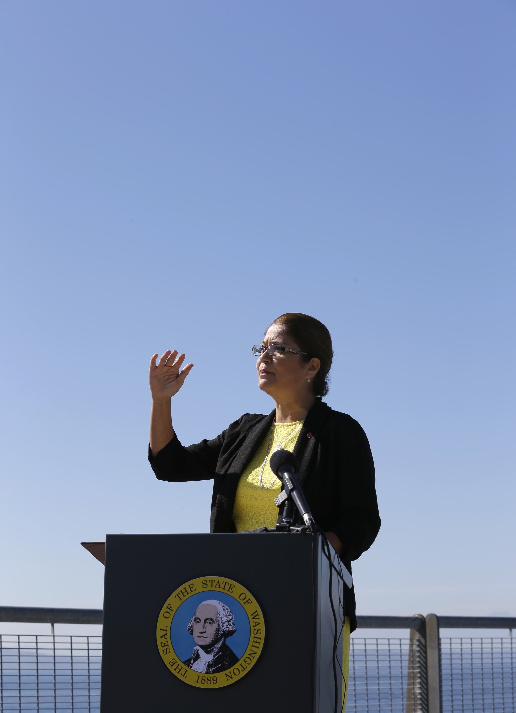 Maia Bellon, director of the state Department of Ecology, speaks at a news conference Thursday overlooking Elliott Bay in Seattle. (Ted S. Warren/The Associated Press)