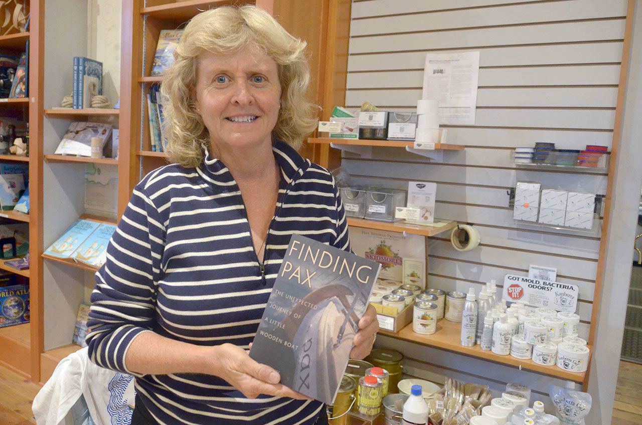 Kaci Cronkhite, author and former director of the Port Townsend Wooden Boat Festival, is debuting her new book, “Finding Pax: The Unexpected Journey of a Little Wooden Boat,” in Port Townsend before taking her tour national in October. (Cydney McFarland/Peninsula Daily News)