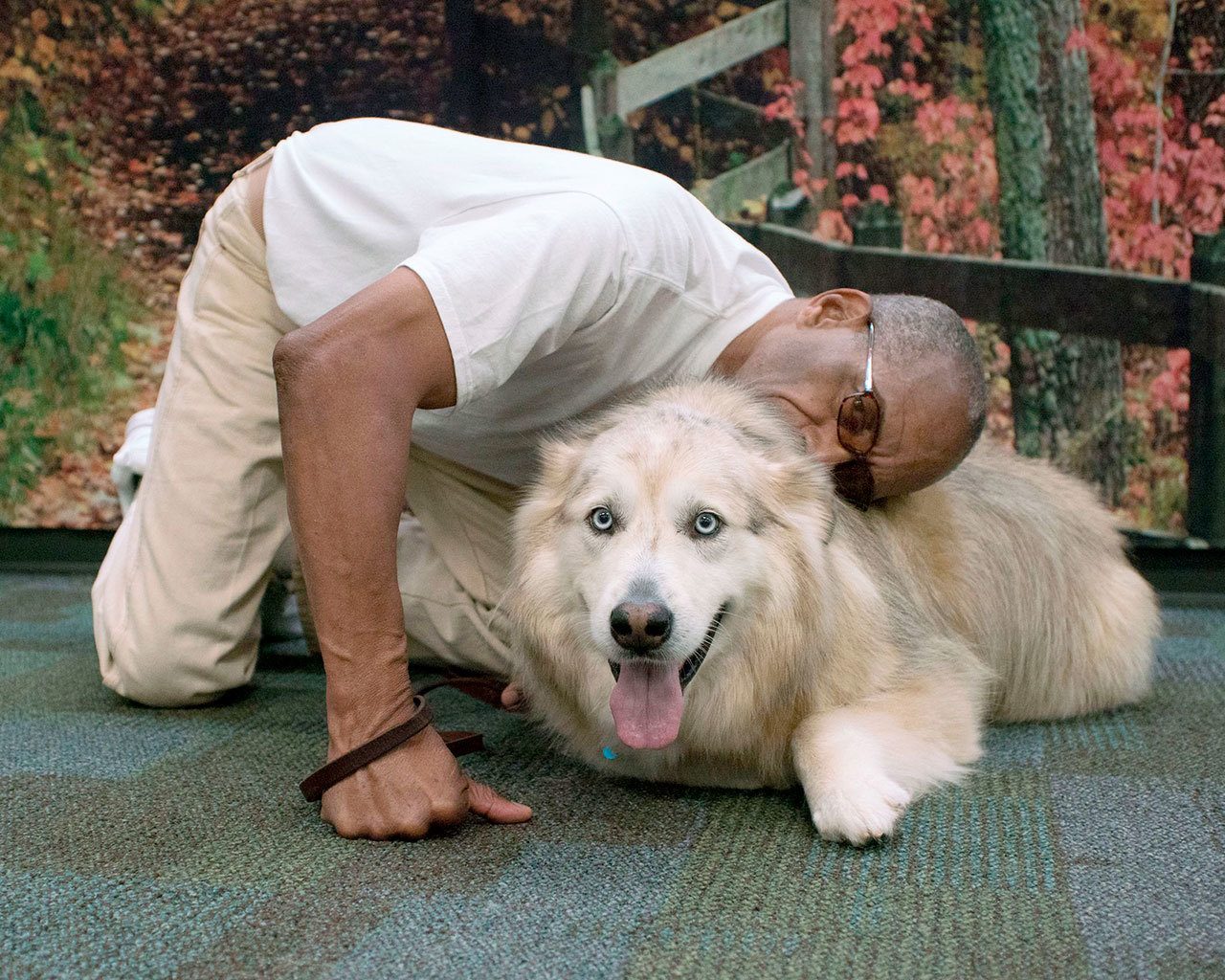 Charles Graves with Sky, a Pyrenees Husky. (Brian Harmon)