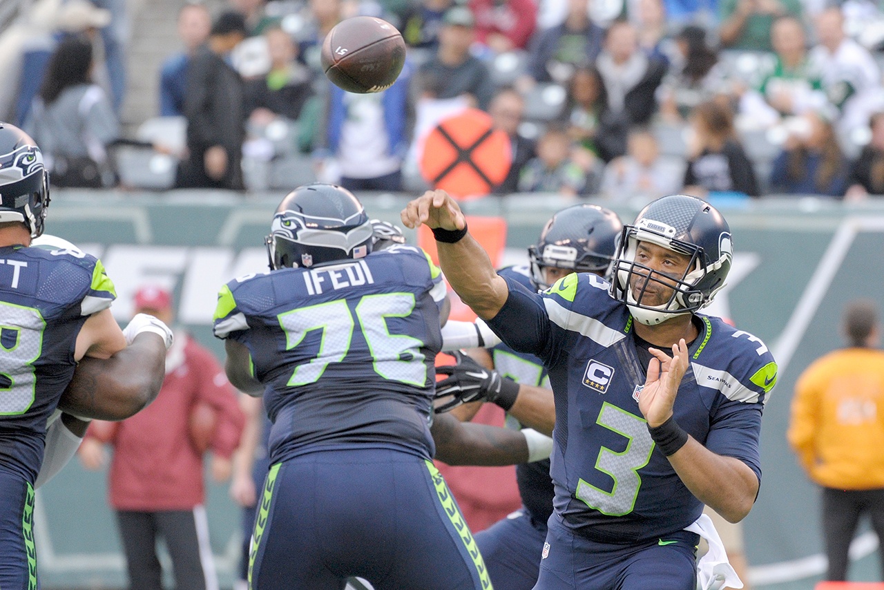 The Associated Press                                Seattle quarterback Russell Wilson (3) throws a pass during the Seahawks&rsquo; 27-17 win over the New York Jets.
