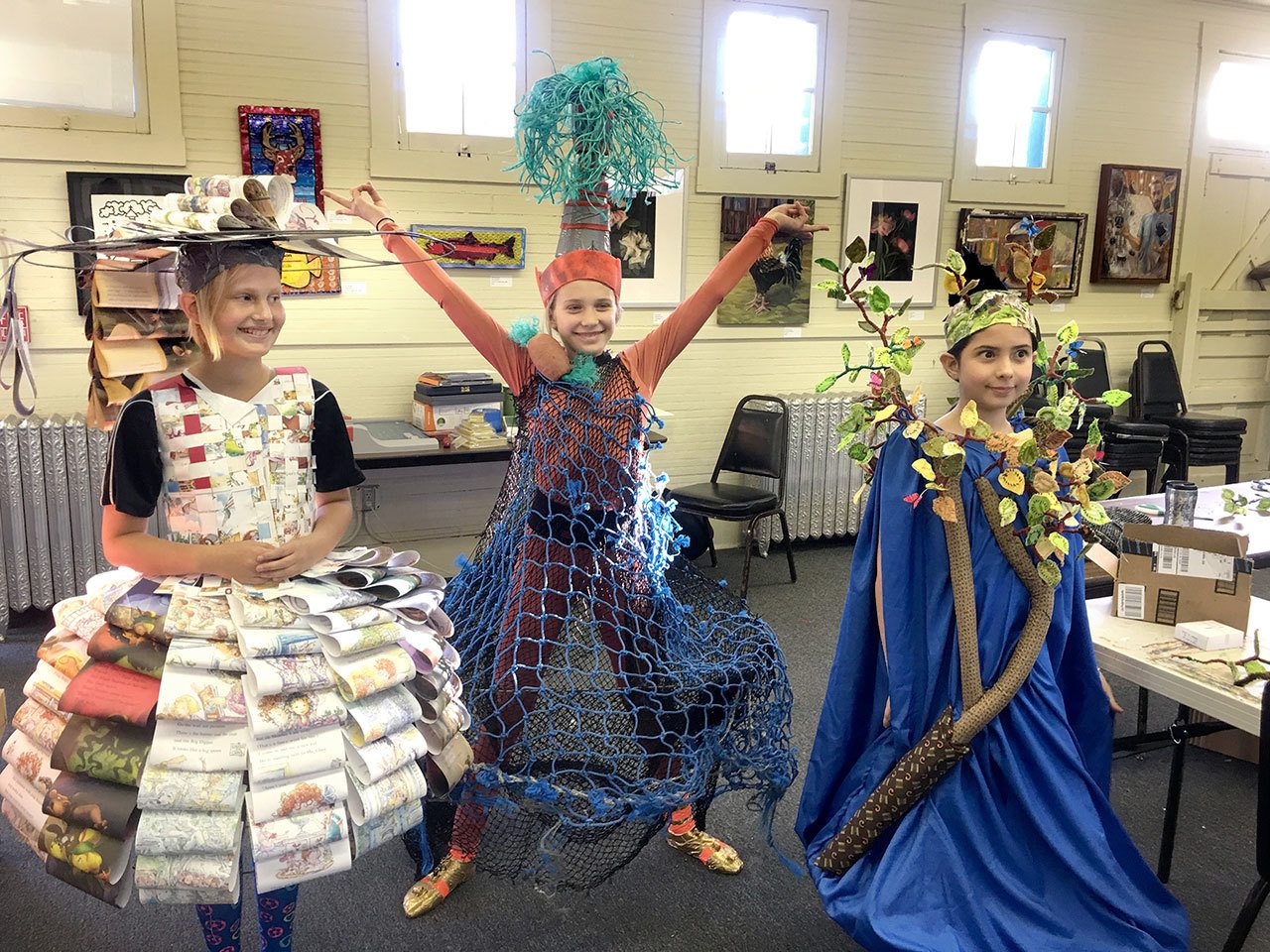 2553: Middle school students Nadia Fisch, Ruby Mills and Biaani Egeler have worked on their creations in a class at the Port Townsend School of Art. They will be presenting them at the student Wearable Art Show on Saturday. (Margie McDonald/Wearable Art Show)