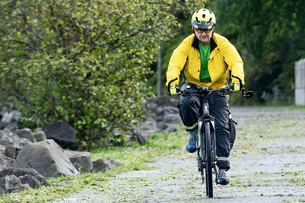 Steve Rose of Sequim cycles on the Olympic Discovery Trail in Port Angeles on Tuesday. (Jesse Major/Peninsula Daily News)
