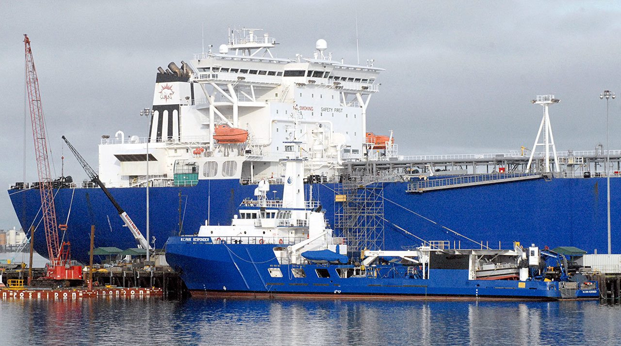 The tanker Polar Discovery sits at the Port of Port Angeles Terminal 1 pier on Saturday. In the foreground is the W.C. Park Responder. (Keith Thorpe/Peninsula Daily News)