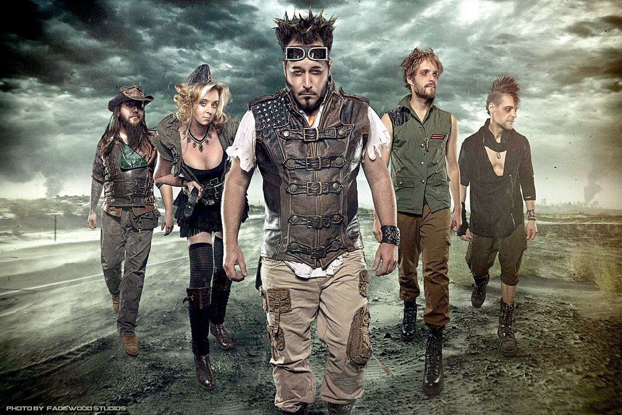 Steampunk band Abney Park — consisting of Robert Brown, center, pianist Kristina Erickson, center left, guitarist Josh Goering, left, bassist Derek Brown, right, and violinist Mitchel Drury, center right — will perform Saturday night at The Metta Room, 132 E. Front St., in Port Angeles. — Fadewood Studios.