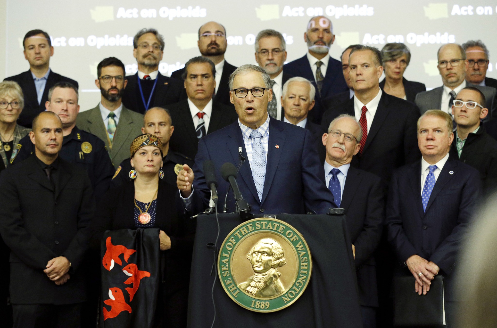 Washington Gov. Jay Inslee speaks Friday at the University of Washington Medical Center in Seattle. Inslee announced an executive order to fight the rising abuse of opioids in Washington state. (Ted S. Warren/The Associated Press)