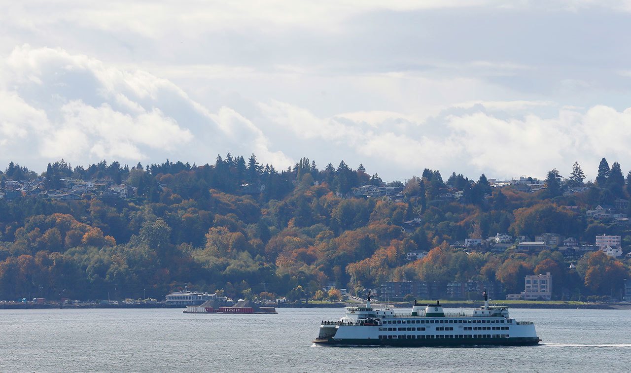 A Washington state ferry sails on Elliott Bay near West Seattle earlier this month. Officials have announced that a new federal task force has been formed to identify restoration priorities for Puget Sound, one of the nation’s largest estuaries. (Ted S. Warren/The Associated Press)