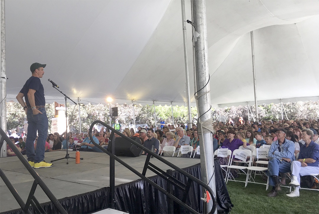 Bil Lepp engrosses a crowd at a storytelling festival in Timpanogos, Utah.