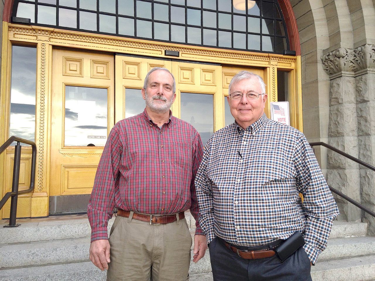 Dave McDermid and Bill Dean of Port Ludlow were two of more than a dozen residents who attended Monday’s county commissioners’ meeting. (Cydney McFarland/Peninsula Daily News)