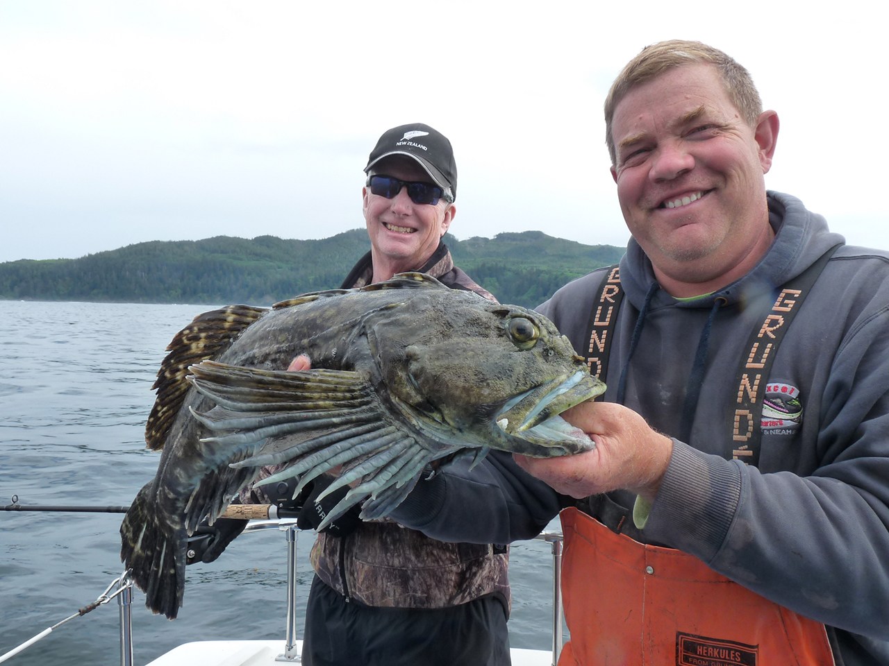 Puget Sound Anglers Puget Sound Anglers member Bob Keck, left, and Excel Charters captain Tom Burlingame display a cabezon caught during a recent fishing trip. Burlingame will speak at Thursday’s Puget Sound Anglers meeting in Sequim.