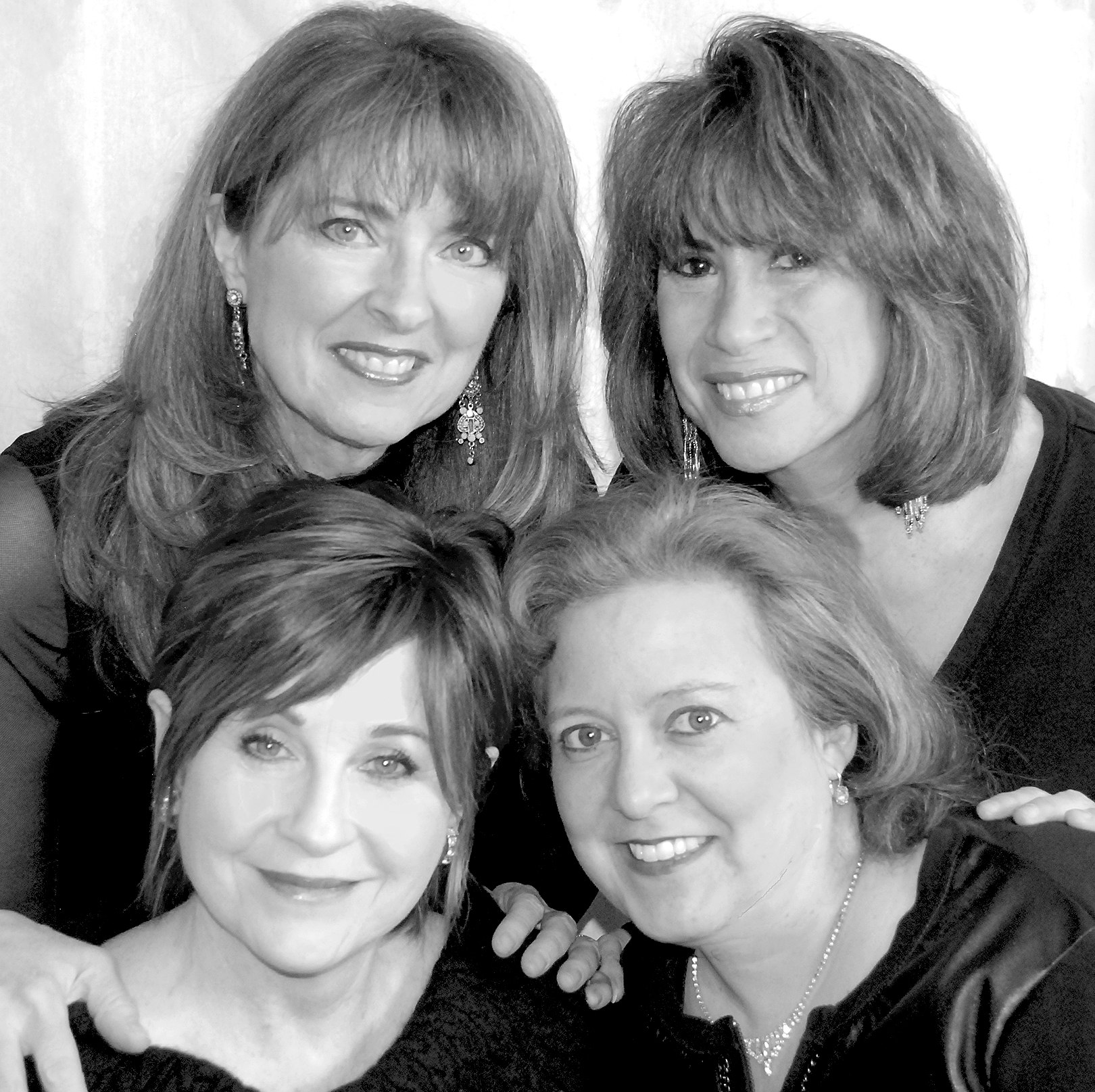 Kendra Chilson                                The Four Bitchin’ Babes are, top from left, Debi Smith and Sally Fingerett and, bottom from left, Megon McDonough and Deirdre Flint.