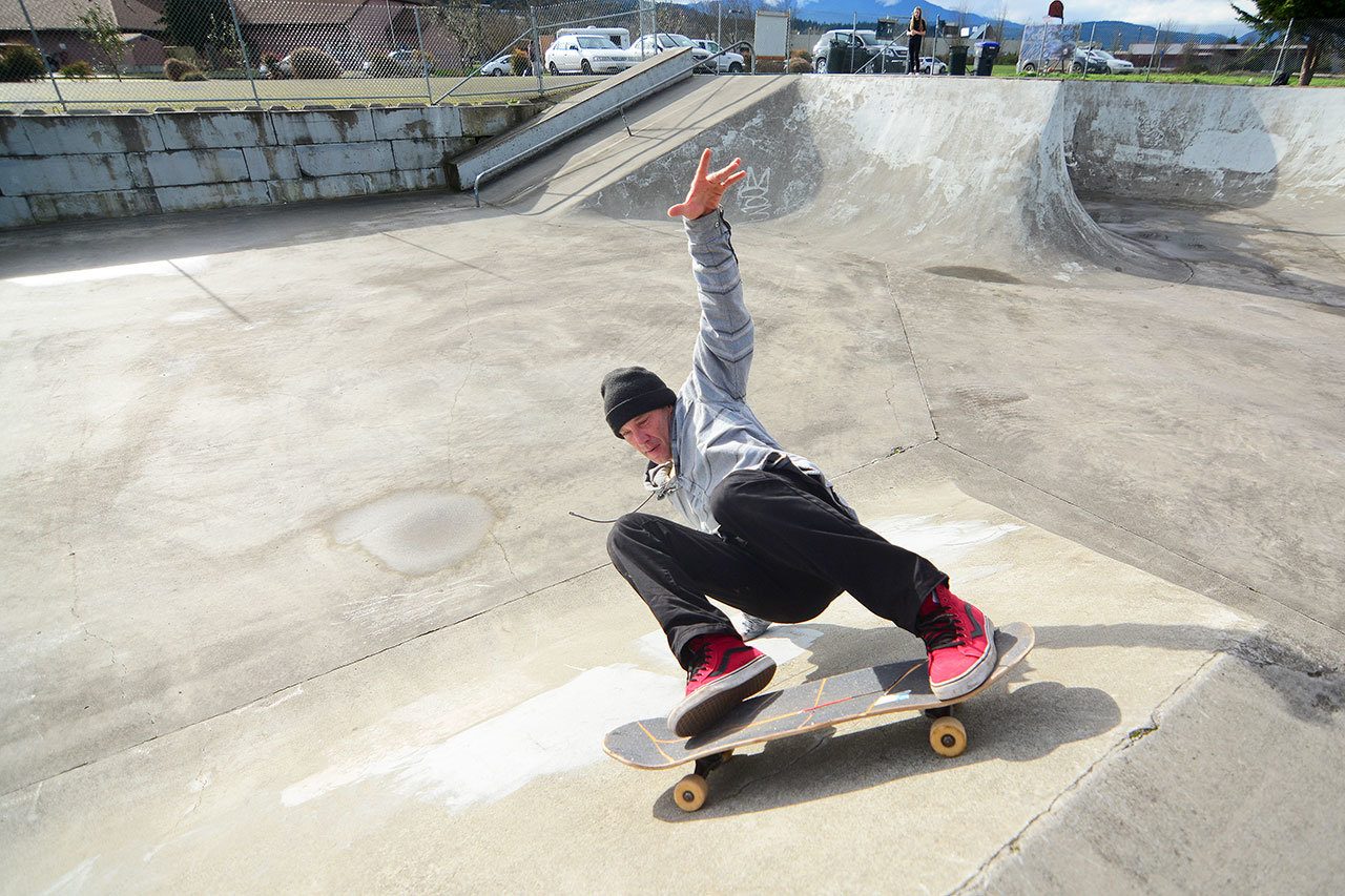 GNU Snowboards team rider Temple Cummins skateboards at the Sequim skate park on Sunday. (Jesse Major / Peninsula Daily News)