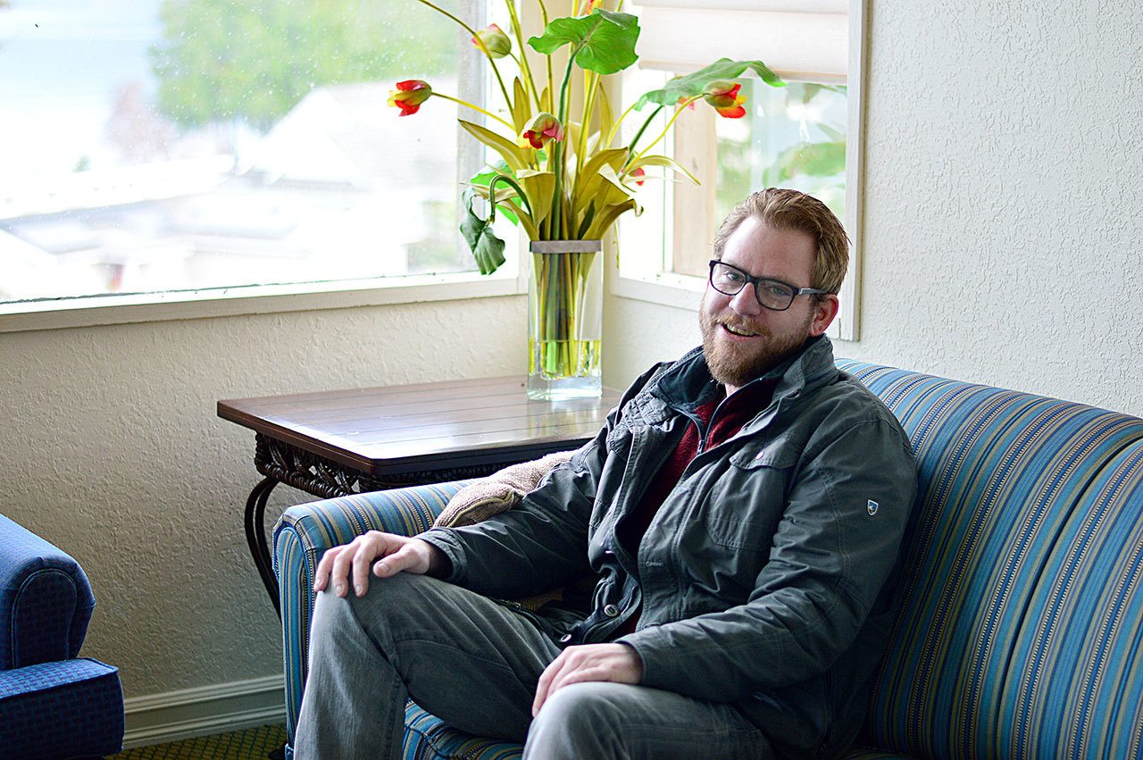 Chris Townsend tells of the help he received as he sits in his room at the Bayside Hotel in Port Hadlock. (Diane Urbani de la Paz/for Peninsula Daily News)