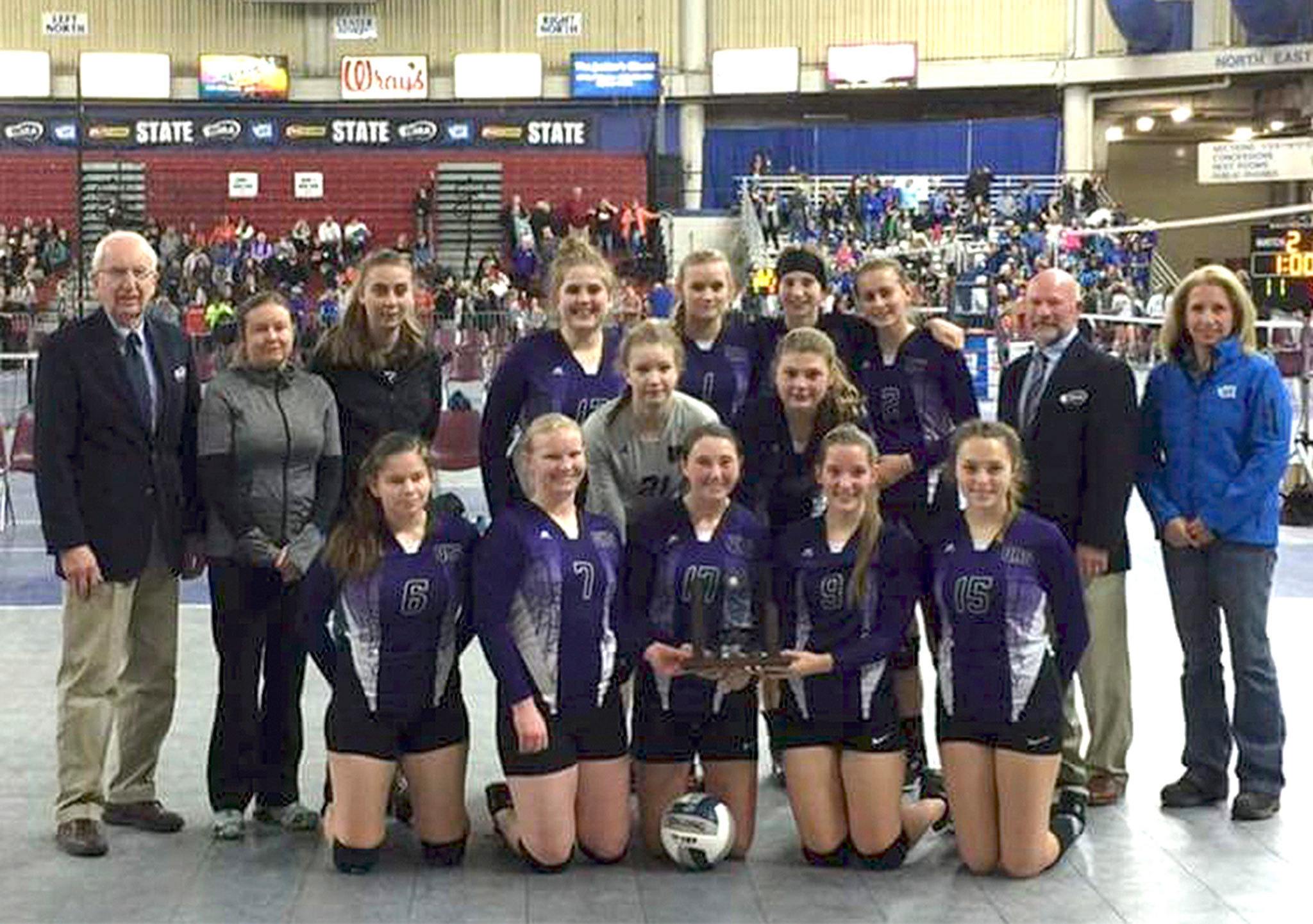 The Quilcene volleyball squad celebrates finishing fourth at the State 1B Volleyball Tournament at the SunDome in Yakima. The Rangers finished the season 22-2.