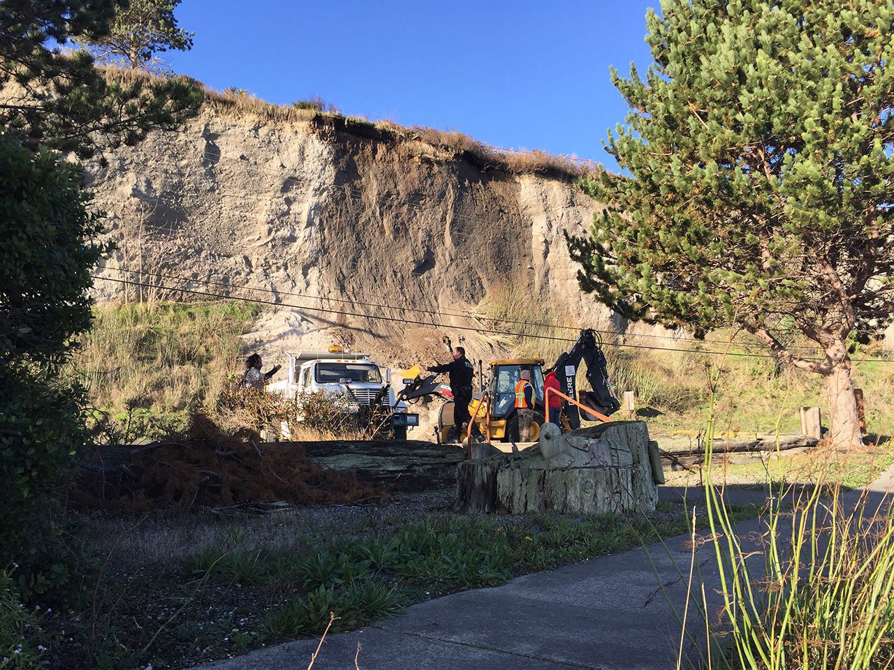 A portion of the bluff above Sims Way slid into the road in Port Townsend on Sunday. (Steve Mullensky/for Peninsula Daily News)
