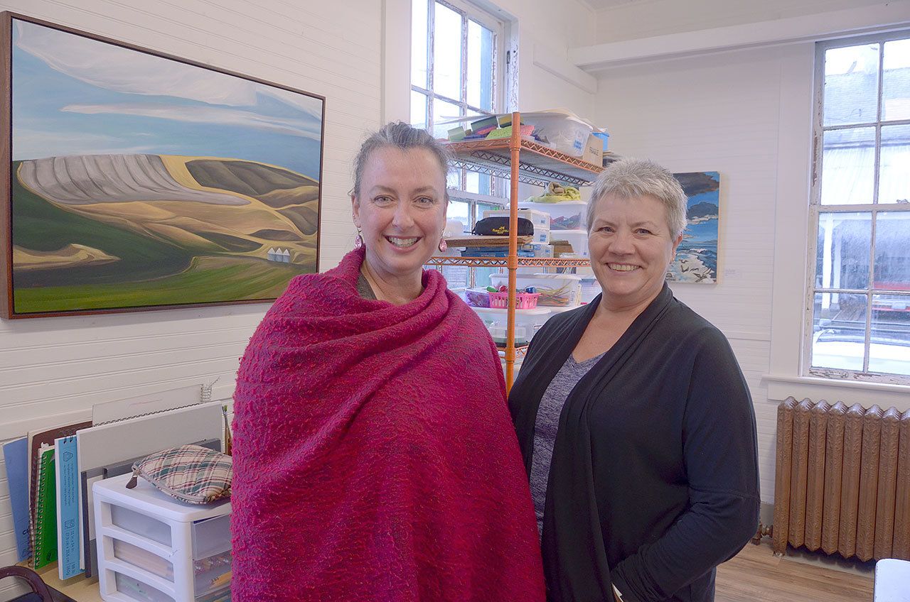 Holly Green and Diane Wheatley of the Port Townsend School of the Arts are celebrating a successful Giving Tuesday which raised the school more than $7,000 from individual donors and another $5,000 since from a donation matching challenge. (Cydney McFarland/Peninsula Daily News)