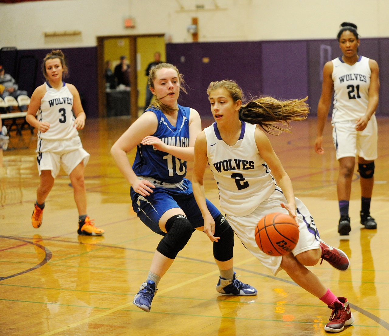 Michael Dashiell/Olympic Peninsula News Group Sequim&rsquo;s Jessica Dietzman, right, drives to the hoop while defended by Chimacum&rsquo;s Maddie Dowling.