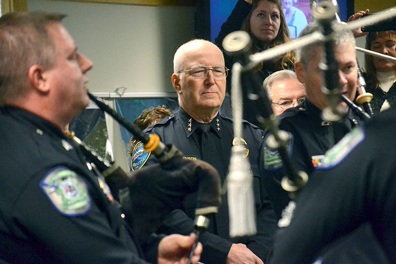 Retiring Sequim Police Chief Bill Dickinson is serenaded by the Seattle Police Pipes & Drums group. (Matthew Nash/Olympic Peninsula News Group)