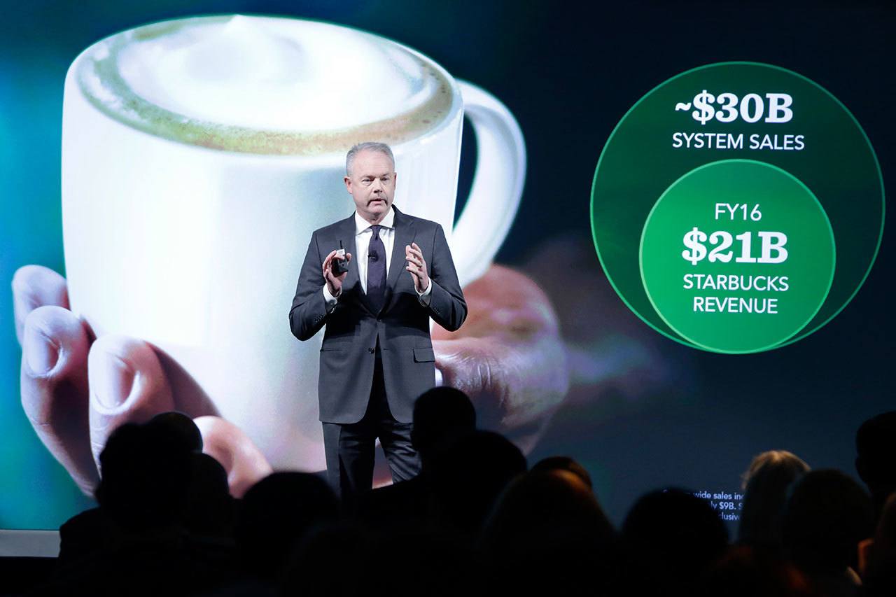 Starbucks President and COO Kevin Johnson presents during the Starbucks 2016 Investor Day meeting in New York on Wednesday. (Richard Drew/The Associated Press)
