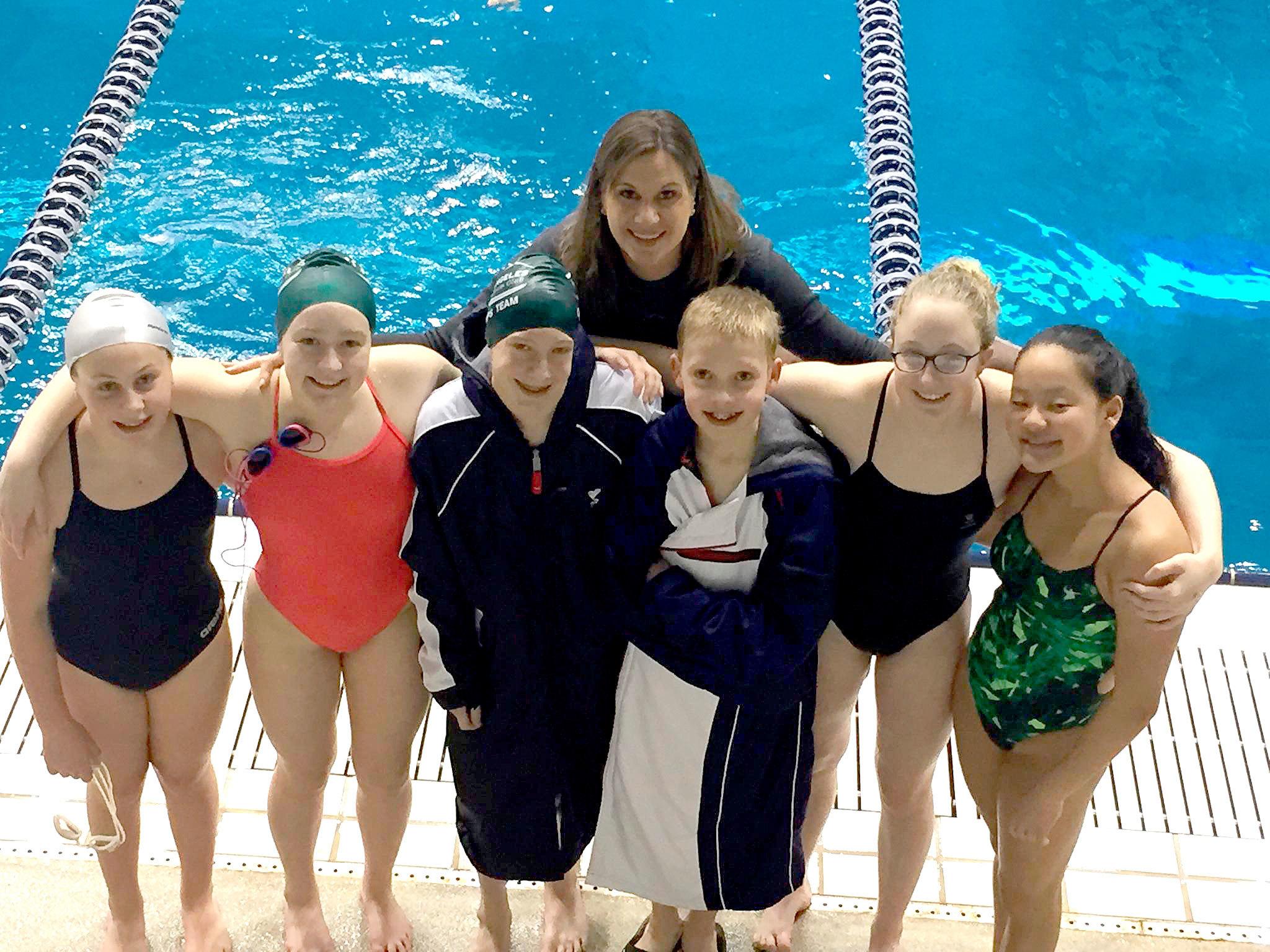 Courtesy photo The Port Angeles Swim Club recently competed at the Pacific Northwest Swim Championships in Federal Way. From left are MacKenzie DuBois (11), Emma Murray (14), Josh Gavin (12), Adam Weller (12), Nadia Cole( 14), Felicia Che (14). In back is swim club coach Jessica Johnson.                                Courtesy photo                                The Port Angeles Swim Club recently competed at the Pacific Northwest Swim Championships in Federal Way. From left are MacKenzie DuBois, age 11; Emma Murray, 14; Josh Gavin, 12; Adam Weller, 12; Nadia Cole, 14; Felicia Che, 14. In back is swim club coach Jessica Johnson.