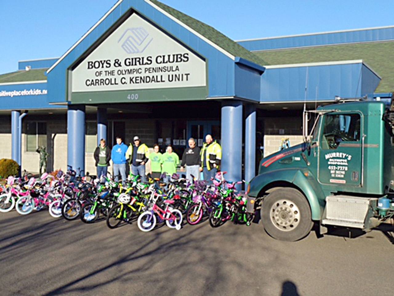 Employees of Murrey’s Olympic Disposal, Inc., of Port Angeles assembled and delivered 65 bikes for children in need that were then donated to and distributed by Boys & Girls Clubs of the Olympic Peninsula.