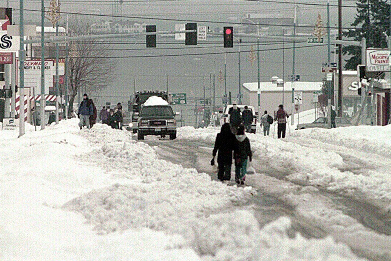 Keith Thorpe/Peninsula Daily News Blankets of snow, measuring as much as three feet deep in parts of Port Angeles with greater amounts in surrounding areas, covers south Lincoln Street in this file photo taken in the wake of a snowstorm that blasted the North Olympic Peninsula on Dec. 28-29, 1996.