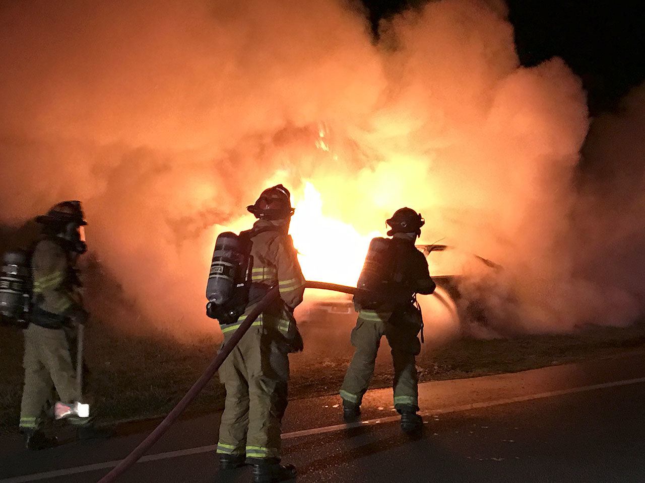A Port Townsend man was uninjured when his car caught fire Thursday night. (Bill Beezley/East Jefferson Fire Rescue)