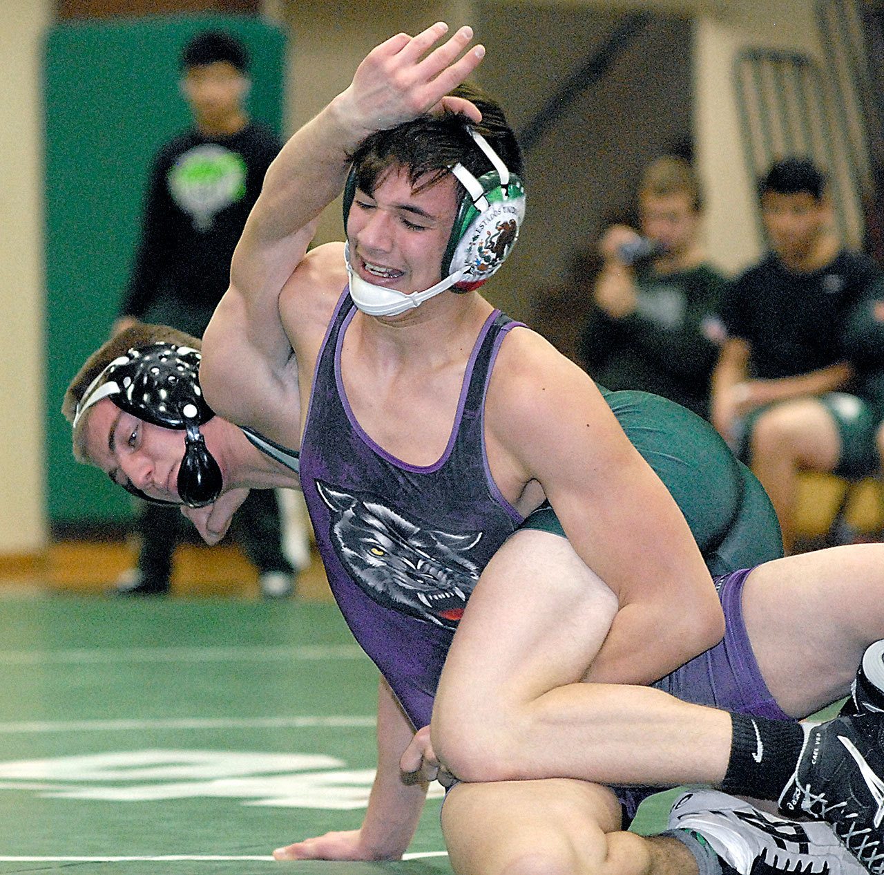 WRESTLING: Sequim grapplers win the Battle of the Axe