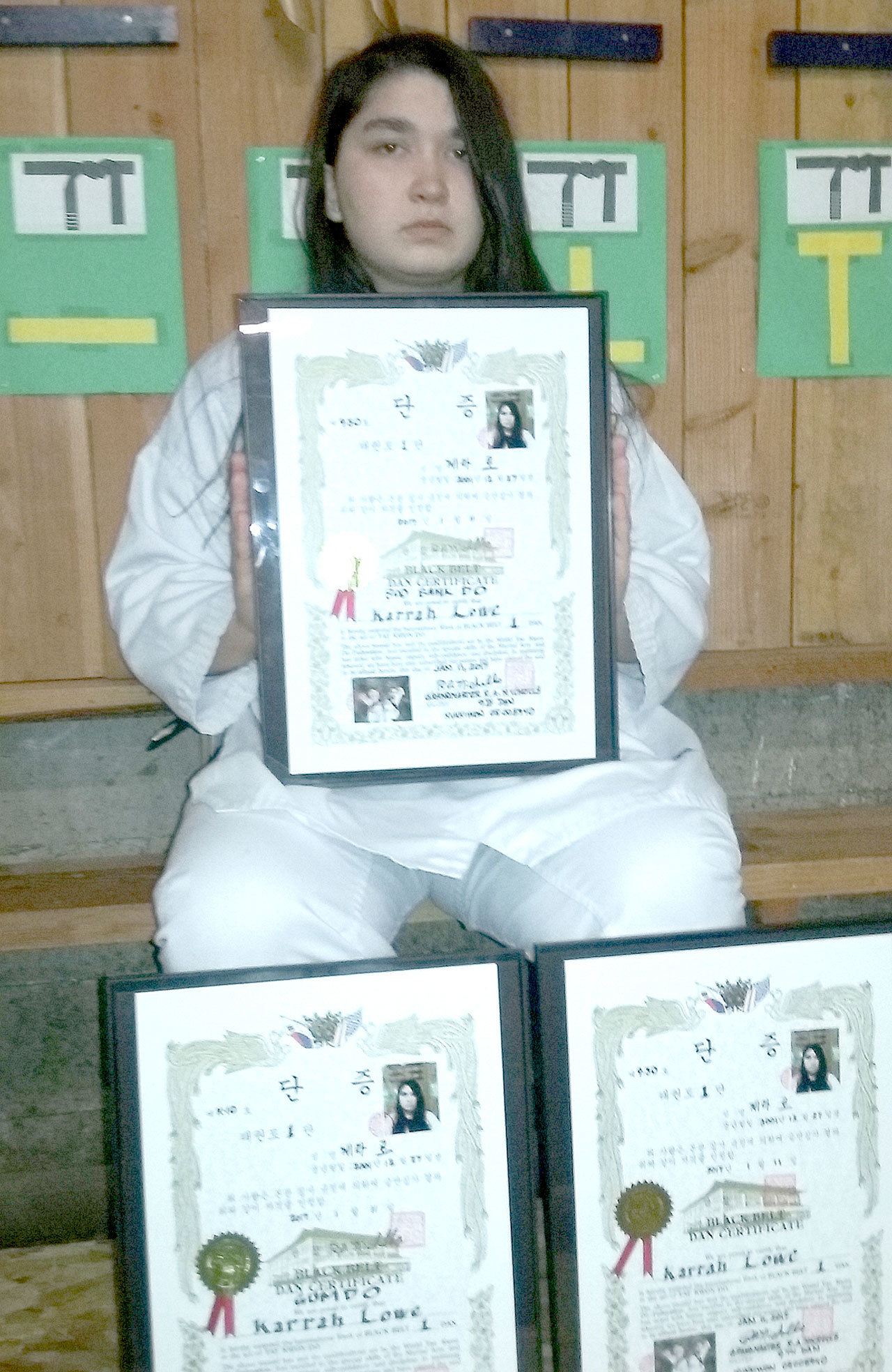 Port Angeles’ Karrah Lowe, age 15, recently became the first White Crane Martial Arts student to attain the rank of black belt in three different disciplines in one testing session.