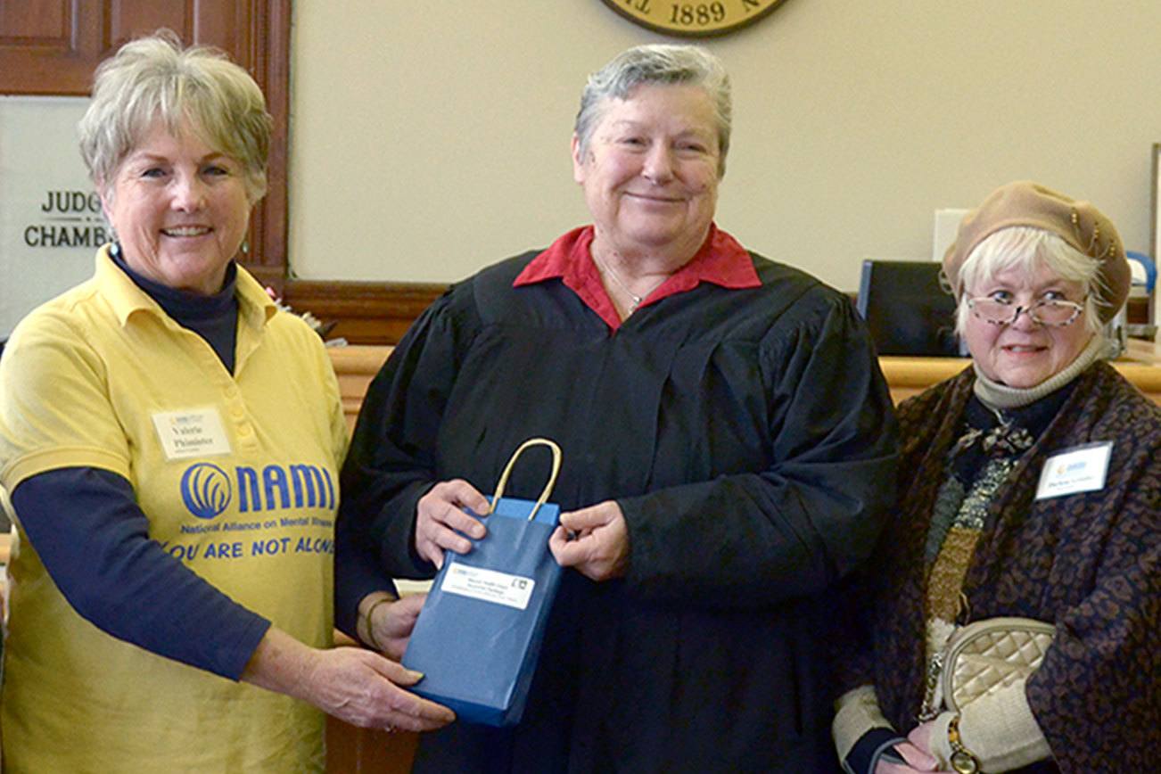 Gift cards presented to graduates of Jefferson County mental health court program