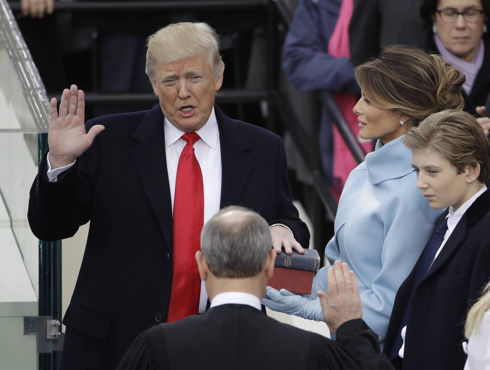 Donald Trump is sworn in as the 45th president of the United States by Chief Justice John Roberts as Melania Trump looks on during the 58th Presidential Inauguration at the U.S. Capitol in Washington. (The Associated Press)