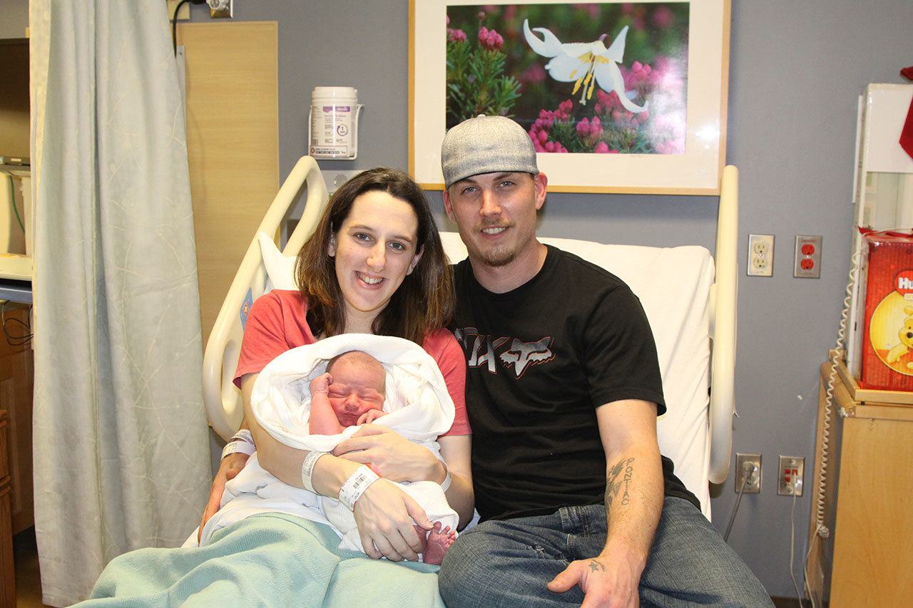 Monica Rice and Jason Rutherford welcomed their son Jason Michael Rutherford Jr. at Olympic Medical Center on Sunday morning. He was the first baby born on the North Olympic Peninsula in 2017. (Dave Logan/for Peninsula Daily News)