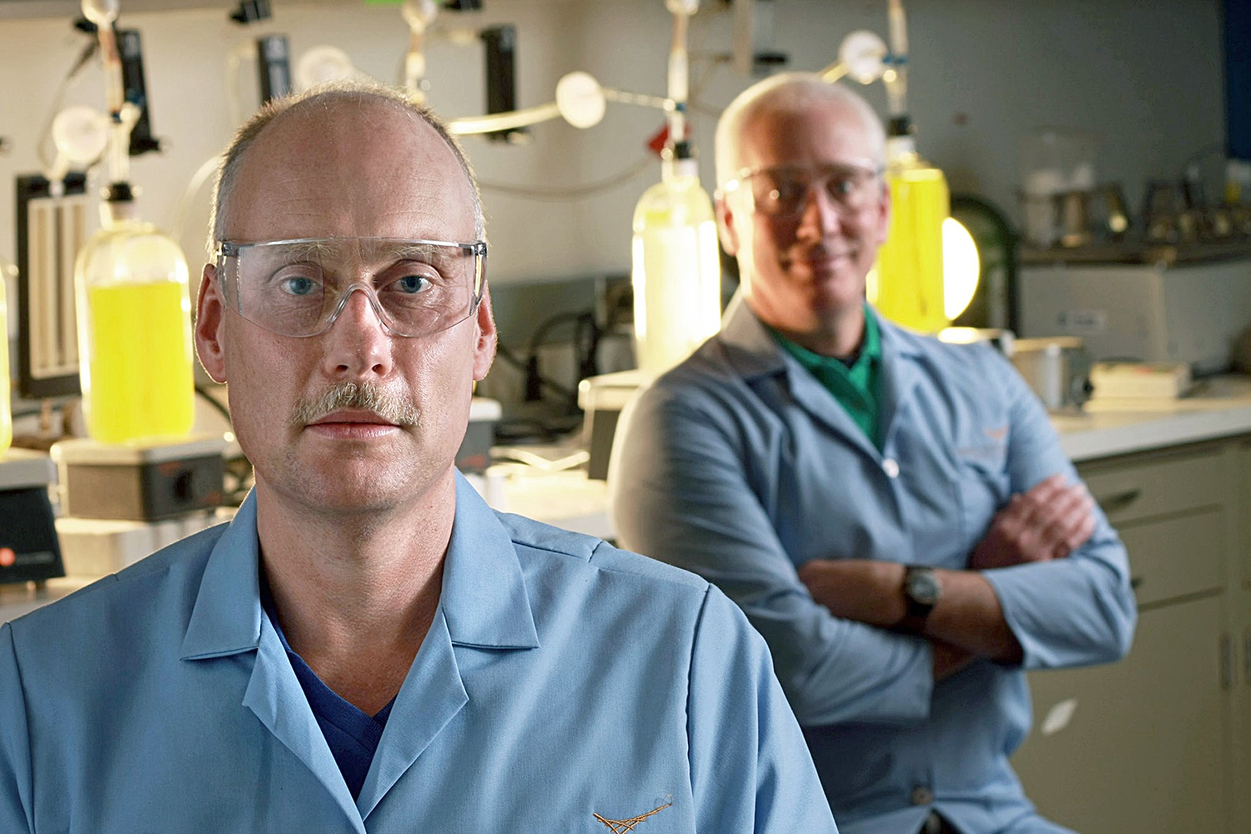 Scientists Michael Huesemann, in front, and Tom Hausmann continue work on finding the best strains of algae for biofuel production. (Pacific Northwest National Laboratory)