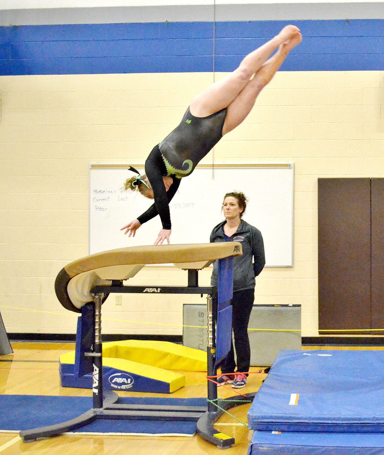 Port Angeles’ Sydney Miner competes in the vault at the Sub-districts held Thursday in Auburn. The Roughriders won the meet and will send their entire team to Districts.