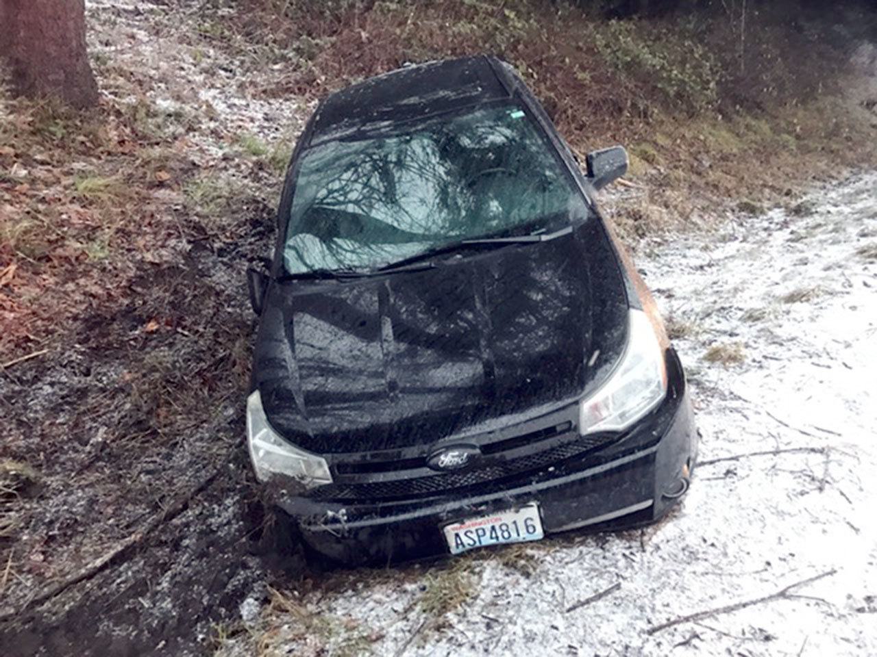 A Ford Focus lost control at milepost 233 on U.S. Highway 101 near Lake Sutherland and drove into a ditch Friday afternoon. (Clallam County Fire District No. 2)