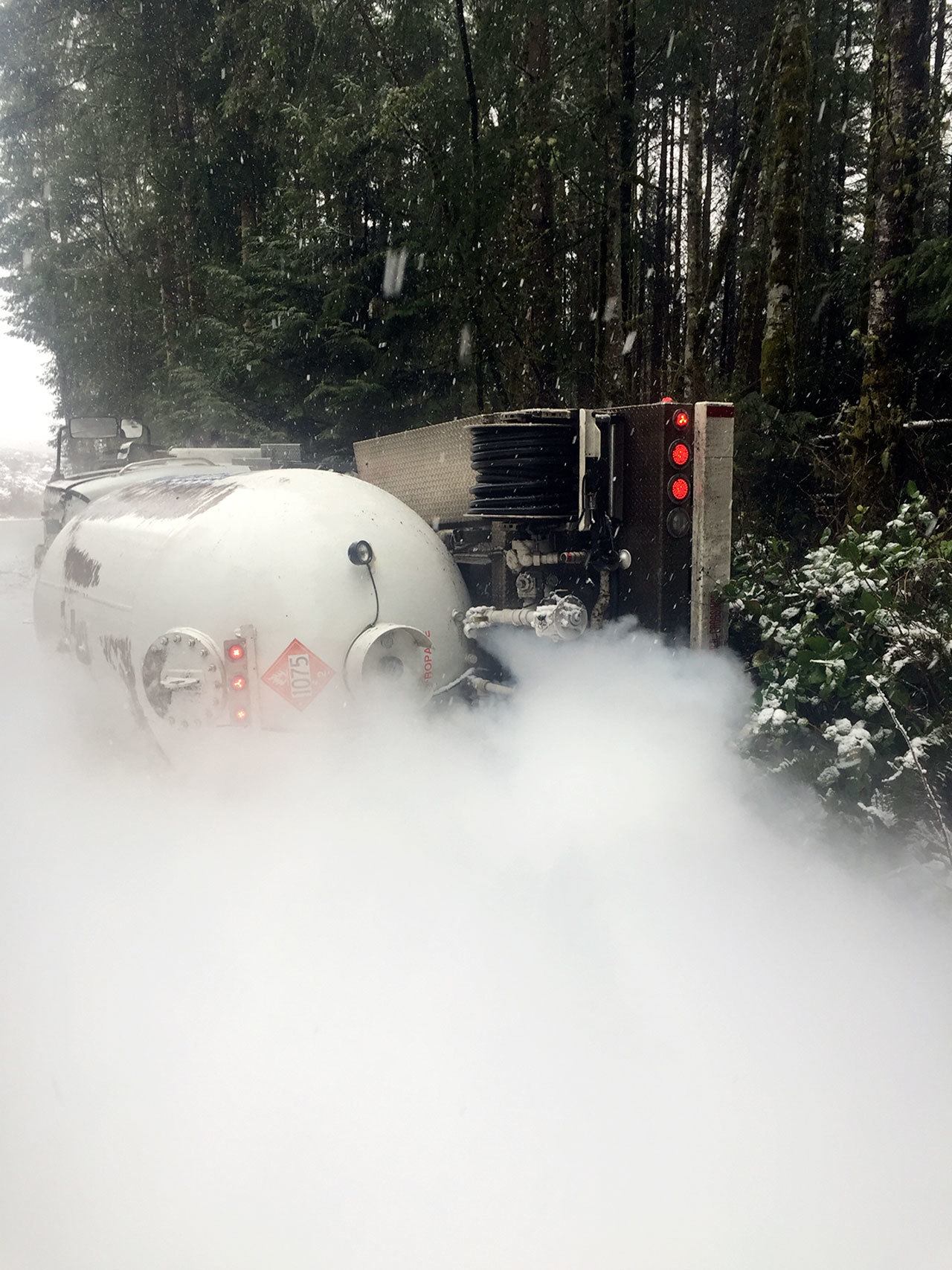 A truck carrying 2,500 gallons of propane overturned at 1057 Teal Lake Road at about 12:26 p.m. Wednesday. The driver escaped without injury.