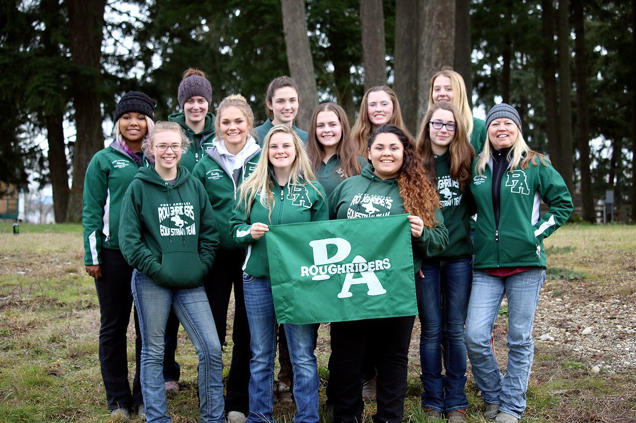 From Jan. 27-29, the Port Angeles High School equestrian team members all gained a top 10 placing at their first Washington State High School Equestrian Team meet of the season. The team members are, back row from left, drill coach Haley Hodgin, Emma Albright, CassiAnn Moore and Abby Hjelmeseth; middle row from left, Ebony Billings, Emily Gear, Kaytee Gibeau, Madison Carlson and coach Tina VanAusdle; and front row from left, Lisi Hanson, Summer Moroz and Kristine Hanson. Not pictured are Emily Menshew and Cassie Roark.